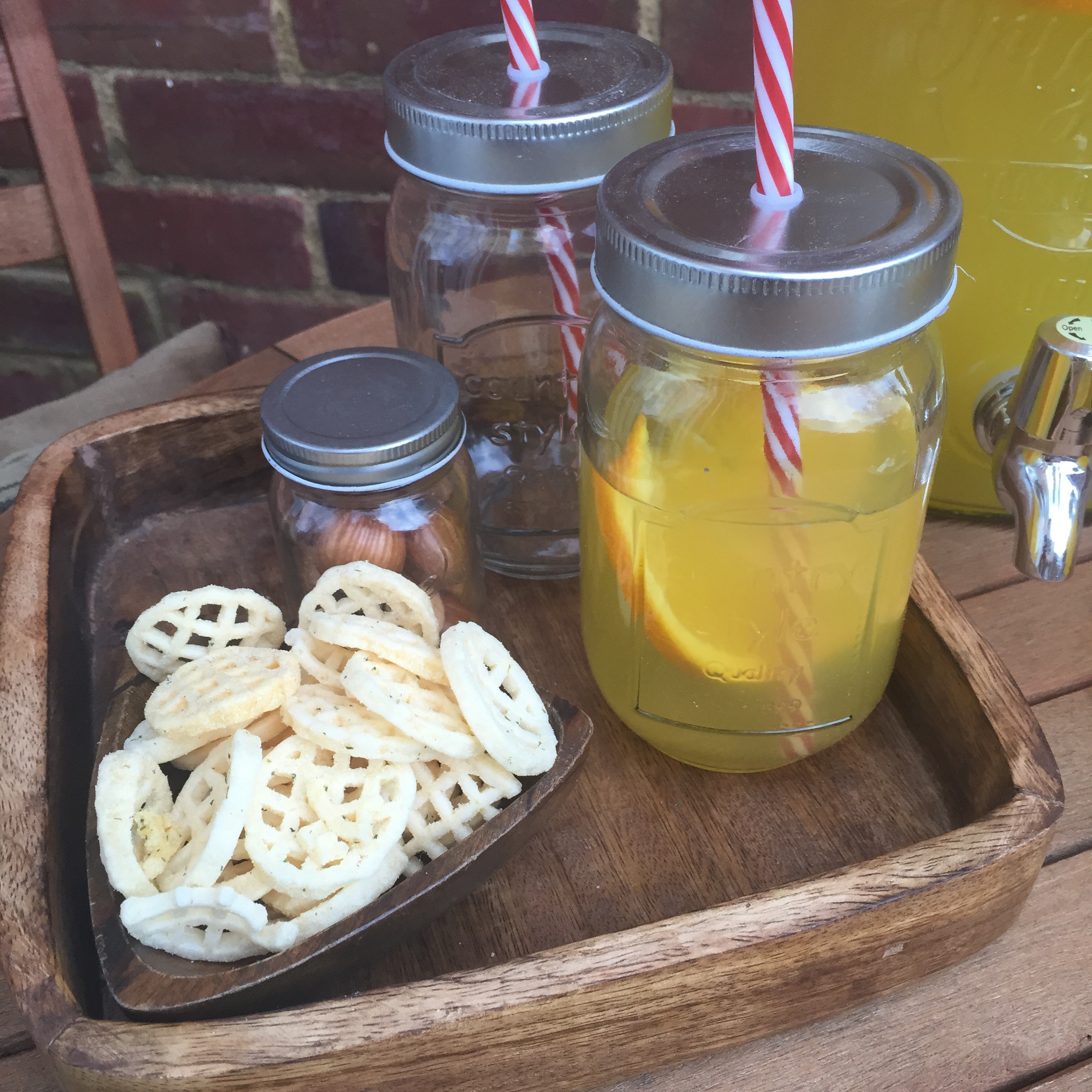 rustic outdoor dining with mason jar glasses via Always a Blue Sky Girl blog